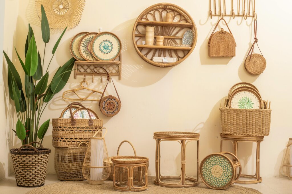 Charming boho interior featuring wicker baskets, rattan furniture, and lush green plants for a natural vibe.
