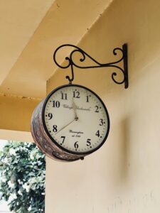 Vintage outdoor clock with ornamental design, Ahmedabad, India.